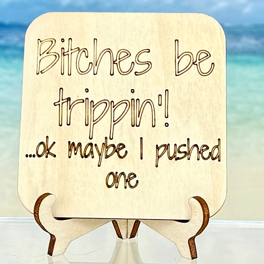 Laser-cut wooden fridge magnet engraved with the quote ‘Bitches be trippin. OK maybe I pushed one’ — handcrafted humorous décor item with strong magnet backing, perfect for a cheeky gift or playful kitchen accent.