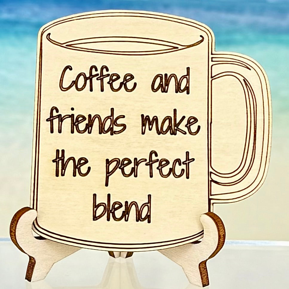 Laser-cut wooden fridge magnet engraved with the quote ‘Coffee and friends make the perfect blend’ — handcrafted décor for coffee lovers and friendship moments.