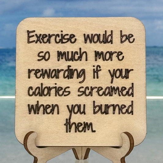 Laser-cut wooden fridge magnet engraved with the quote ‘Exercising would be so much more rewarding if your calories screamed when you burned them.’ — handcrafted humorous décor piece with strong magnet backing, perfect for gym lovers and snack fans.