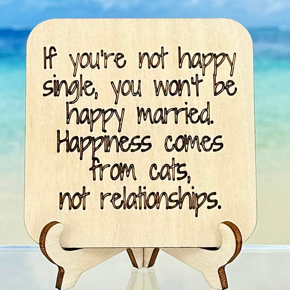 Laser-cut wooden fridge magnet engraved with the quote ‘If you are not happy single, you won’t be happy married. Happiness comes from cats, not relationships.’ — handcrafted décor gift for cat lovers with strong magnet backing.