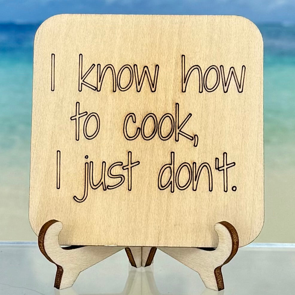 Laser-cut wooden fridge magnet engraved with the quote ‘I know how to cook… I just don’t’ — handcrafted, humorous décor piece with strong magnet backing.