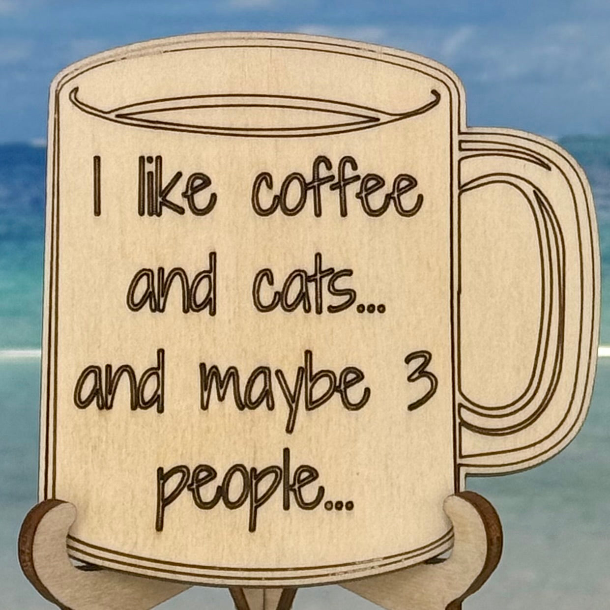 Laser-cut wooden fridge magnet engraved with the quote ‘I Like Coffee and Cats … and maybe 3 people’ — handcrafted gift for coffee & cat lovers with humor.
