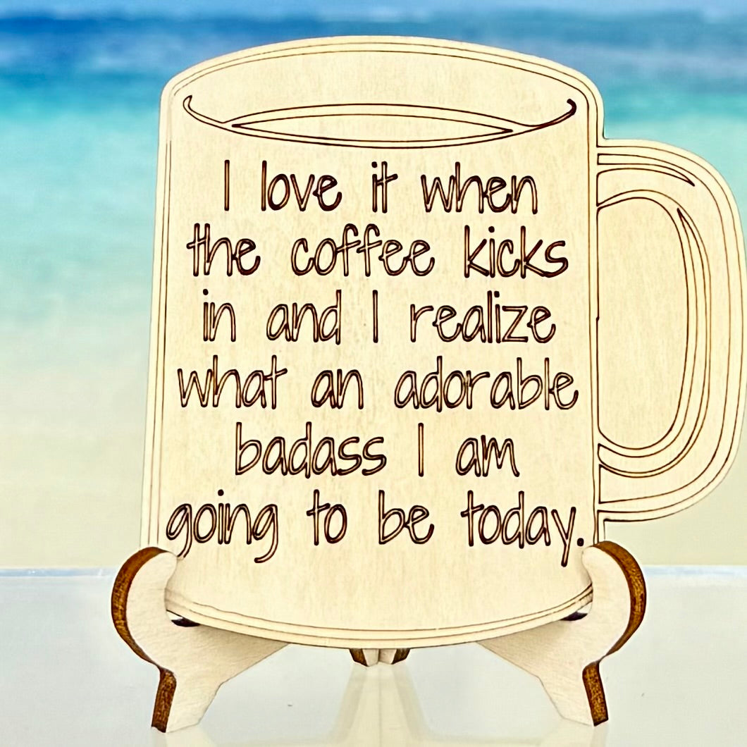 Laser-cut wooden fridge magnet engraved with the quote ‘I love it when the coffee kicks in and I realize what an adorable badass I am going to be today’ — handcrafted and humor-filled décor for coffee lovers.