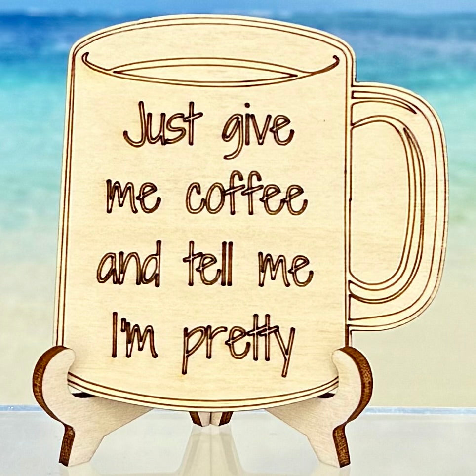 Laser-cut wooden fridge magnet engraved with the quote ‘Just give me coffee and tell me I’m pretty’ — handcrafted gift for coffee lovers, with strong magnet backing and humor-filled décor.