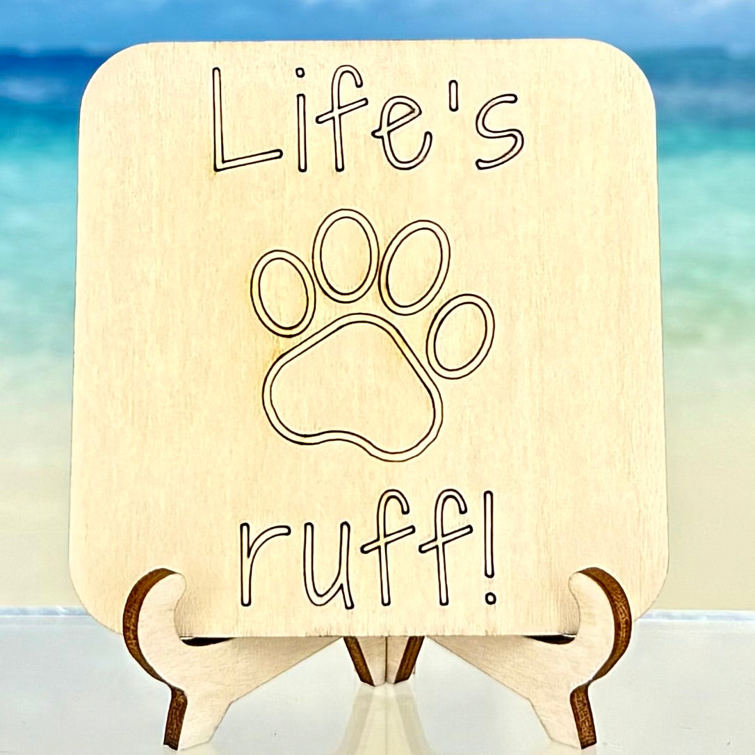 Laser-cut wooden fridge magnet engraved with the quote ‘Life’s ruff’ alongside a paw print design — handcrafted décor gift for dog lovers.
