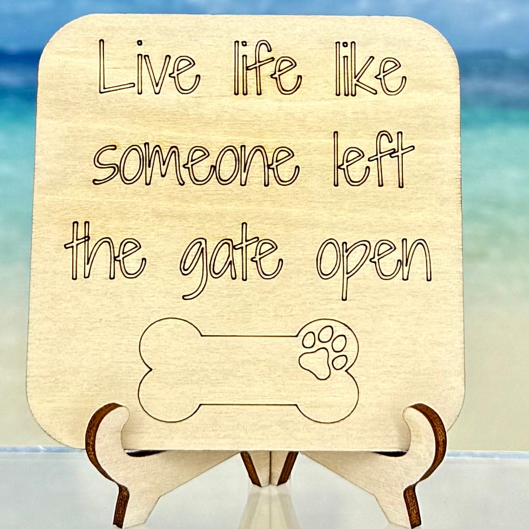 Laser-cut wooden fridge magnet engraved with the quote ‘Live life like someone left the gate open’ — handcrafted décor piece with strong magnet backing, perfect for free-spirited and joyful homes.