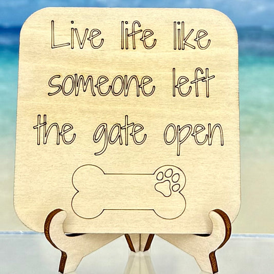 Laser-cut wooden fridge magnet engraved with the quote ‘Live life like someone left the gate open’ — handcrafted décor piece with strong magnet backing, perfect for free-spirited and joyful homes.