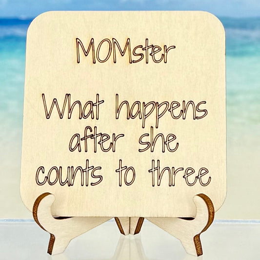 Laser-cut wooden fridge magnet engraved with the playful quote ‘MOMster… What Happens After She Counts to Three’ — handcrafted, with strong back magnet, perfect for moms with a sense of humor.