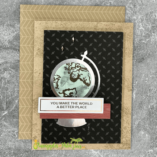 Encouraging greeting card with a globe illustration and the message “You Make the World a Better Place” on the front.