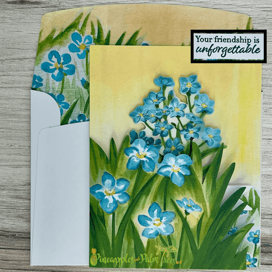Friendship greeting card “Your Friendship Is Unforgettable” with forget‑me‑not flowers on the front.