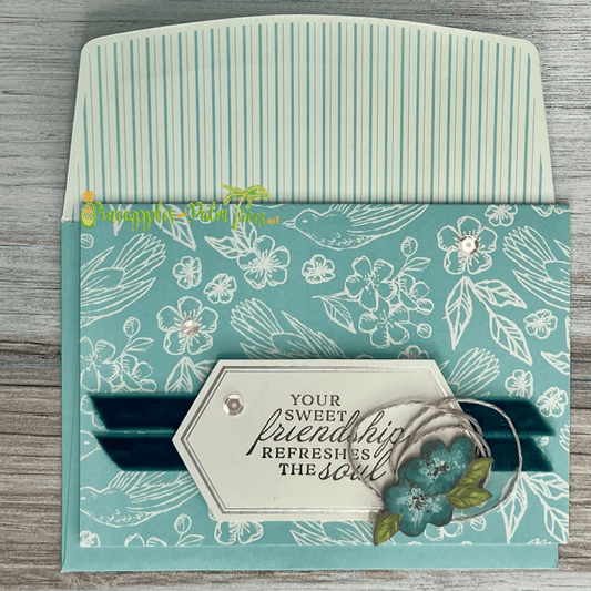 Greeting card “Your Sweet Friendship Refreshes the Soul” with blue floral design on the front cover.